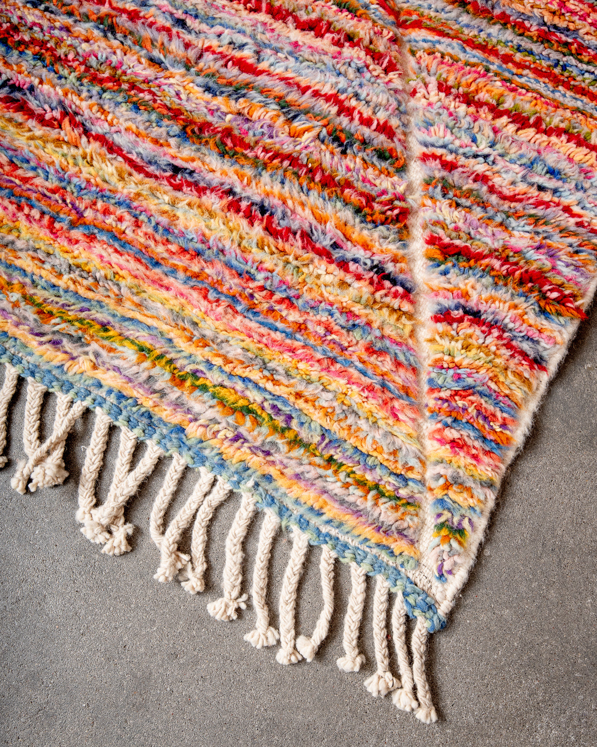 Modern, designer, handcrafted Berber rug from Morocco. Beniourain carpet with beautiful colours and patterns and fluffy wool texture.